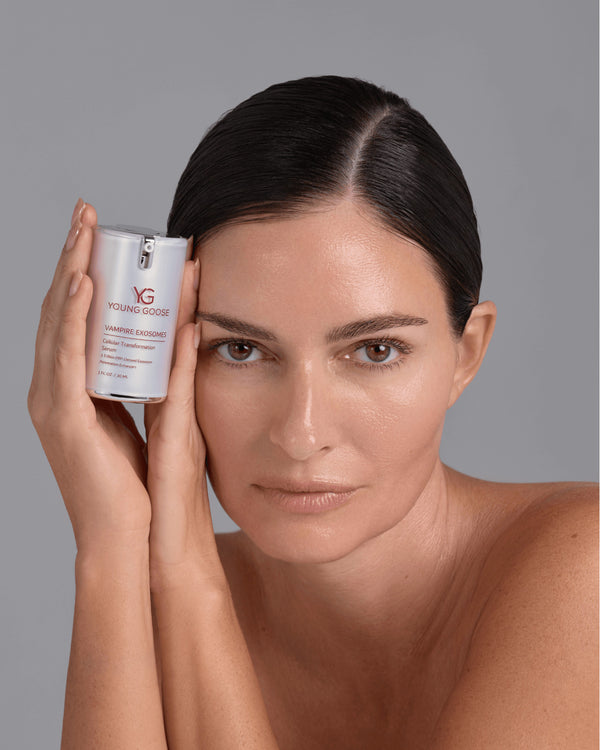 Woman holding a Young Goose Vampire Exosomes Serum